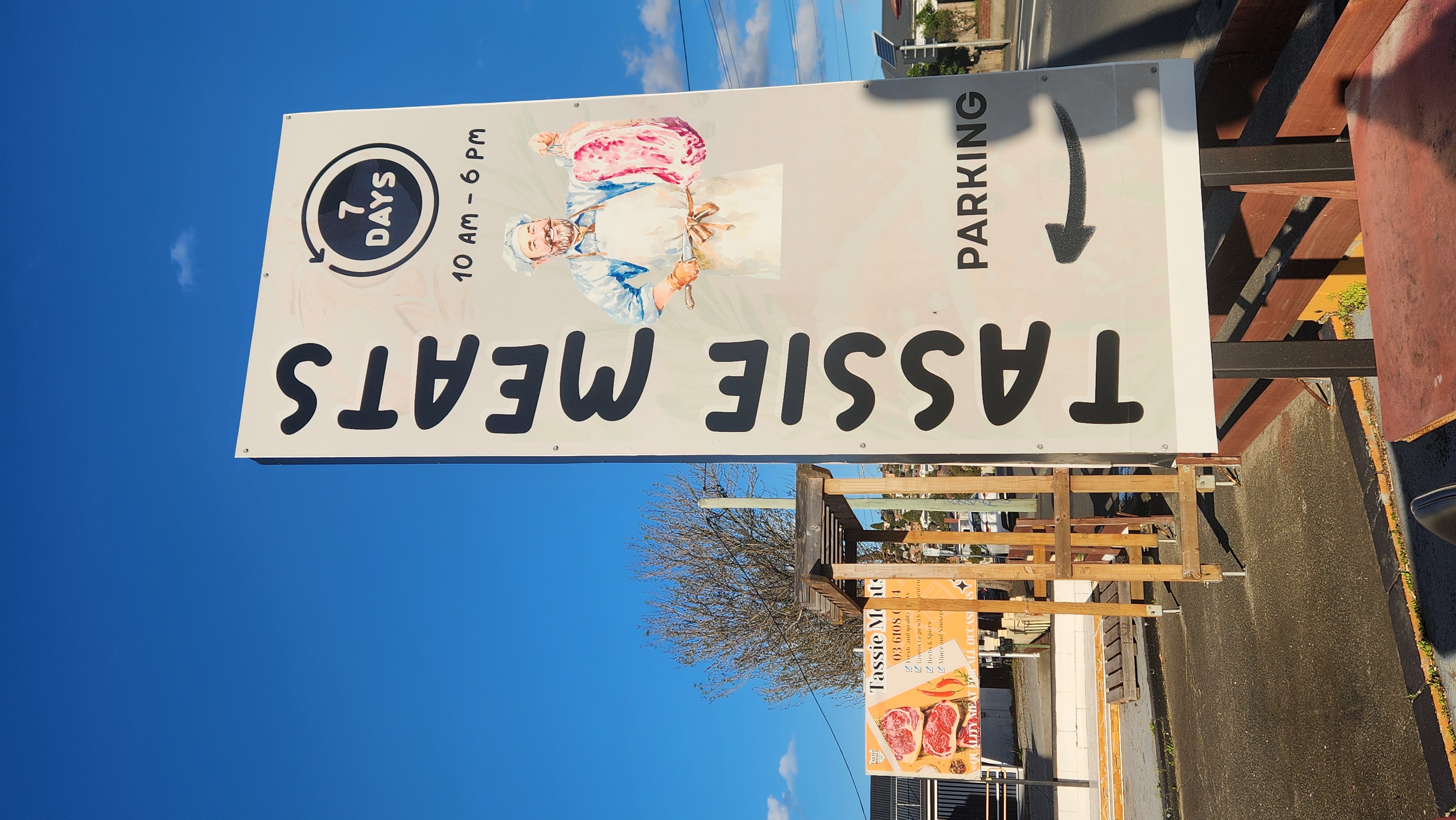Tassie Meats opening hours and parking sign